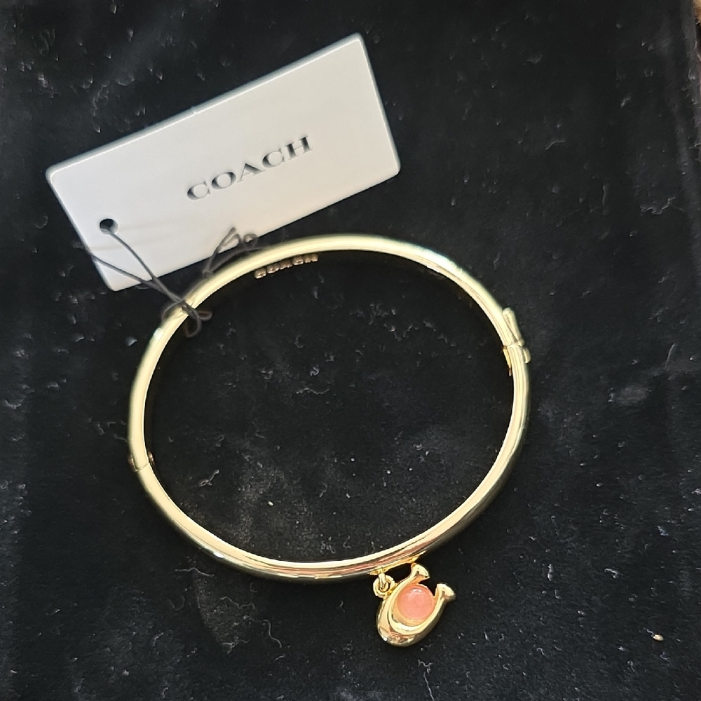 Coach Gold Bracelet with Pink Charm